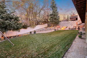 Fenced backyard featuring a patio area