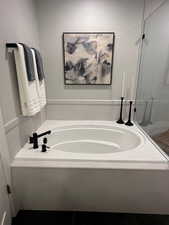 Full bathroom with a bath