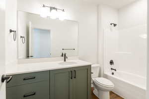 Full bathroom featuring vanity and bathing tub / shower combination