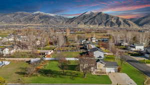 Aerial view at dusk of a mountain view and a residential view