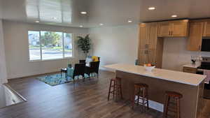 Looking from semi-formal dining to living area and spectacular views of the Wasatch mountains