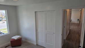 2nd bedroom with closet & hallway back to great room