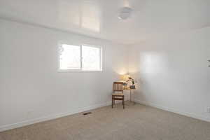 Primary bedroom with new flooring and paint
