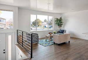 Wrought iron railings, LVP flooring, new windows and new doors