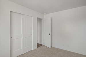 Bedroom #3 closet and door to hallway