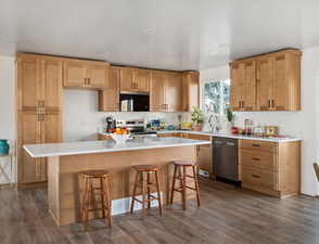 Ceiling above island wired to add pendant lighting