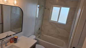 Bathroom with vanity & shower / bath combination