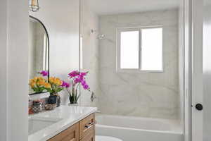 Main bath with tub and shower