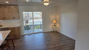 Semi-formal dining area with sliders out to deck