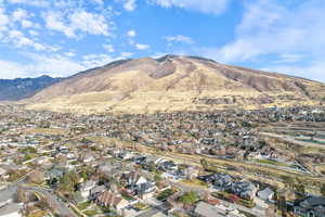 View of mountain backdrop with nearby suburban area
