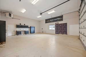 Garage featuring a heating unit