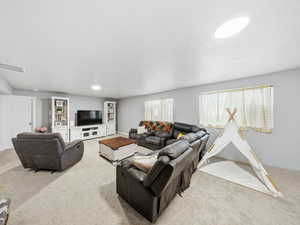 Living room featuring carpet floors and recessed lighting