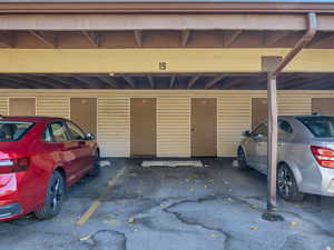 Garage featuring covered parking