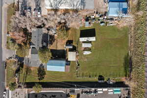 Aerial view of property's location featuring a pool area