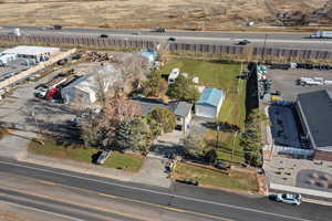 Aerial overview of property's location with an industrial area