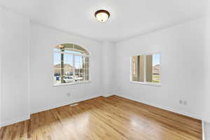 Den or Office, room with light wood-style flooring and baseboards