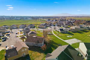 Aerial view of property's location featuring nearby suburban area