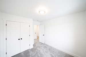 Photo of home built in past by OLO.  Unfurnished bedroom with carpet and a closet