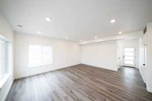 Photo of home built in past by OLO.  Spare room with wood finished floors and recessed lighting