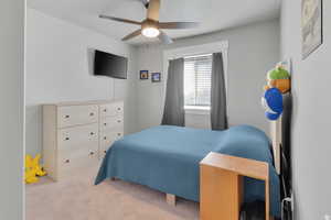 Bedroom with carpet floors and ceiling fan