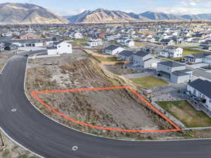 Aerial view of residential area w/Users/charliebackus/Desktop/Mt Sterling Farms /Mt Sterling Farms Hyrum-1.jpgith a mountainous background and property parcel outlined