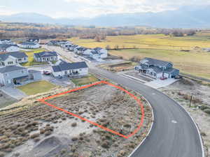 Aerial view of residential area with a mountain backdrop
