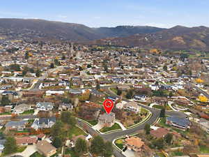 View of property location with nearby suburban area and a mountainous background