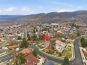 View of property location with nearby suburban area and a mountain backdrop