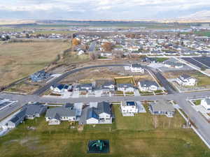 Aerial overview of property's location with nearby suburban area