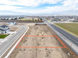 View of property location with property boundaries highlighted and a mountainous background