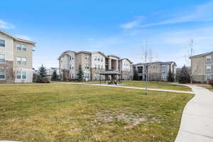 View of community with a gazebo and a lawn
