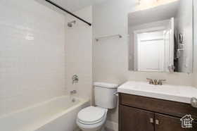Full bathroom with vanity and shower / washtub combination