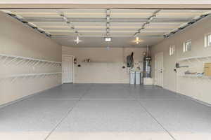 Garage with strapped water heater