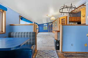 Kitchen featuring vaulted ceiling
