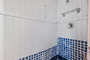 Full bath with tiled shower