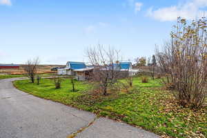 Exterior space featuring a front yard
