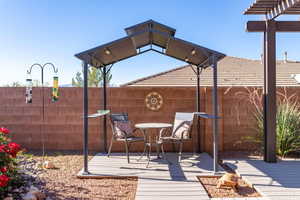 View of patio / terrace featuring a pergola and a wooden deck
