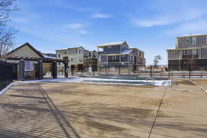View of swimming pool featuring a pergola and a residential view