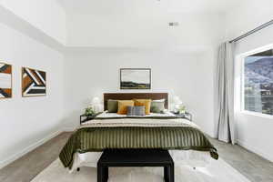 Bedroom featuring carpet floors