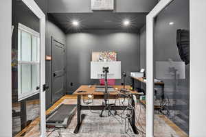 Home office featuring wood finished floors