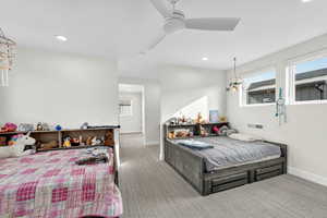 Bedroom with carpet floors, recessed lighting, and a ceiling fan