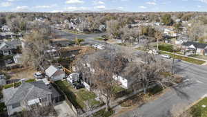 Aerial overview of property's location featuring nearby suburban area