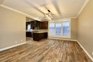 Formal dining room with valley/mountain vies from large window and hardwood floors