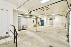 Extra large 3 bay garage with a garage door openers