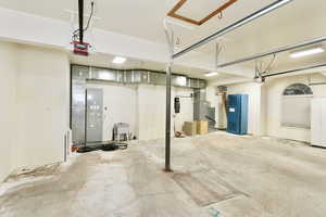 Extra large 3 bay garage with a garage door openers