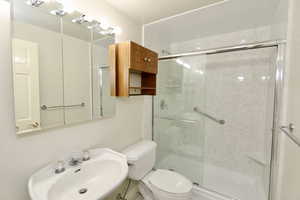 Light bathroom with walk-in shower