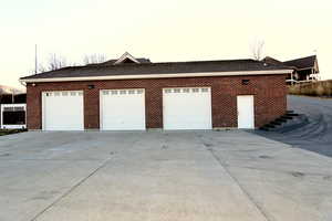 Large detached, heated garage with 3/4 bathroom