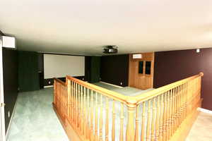 Theater with tiered seating and surround sound