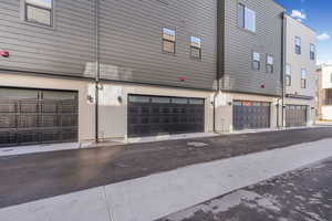View of home's exterior featuring a garage and stucco siding