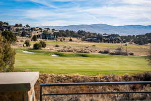 View of mountain backdrop with a golf club